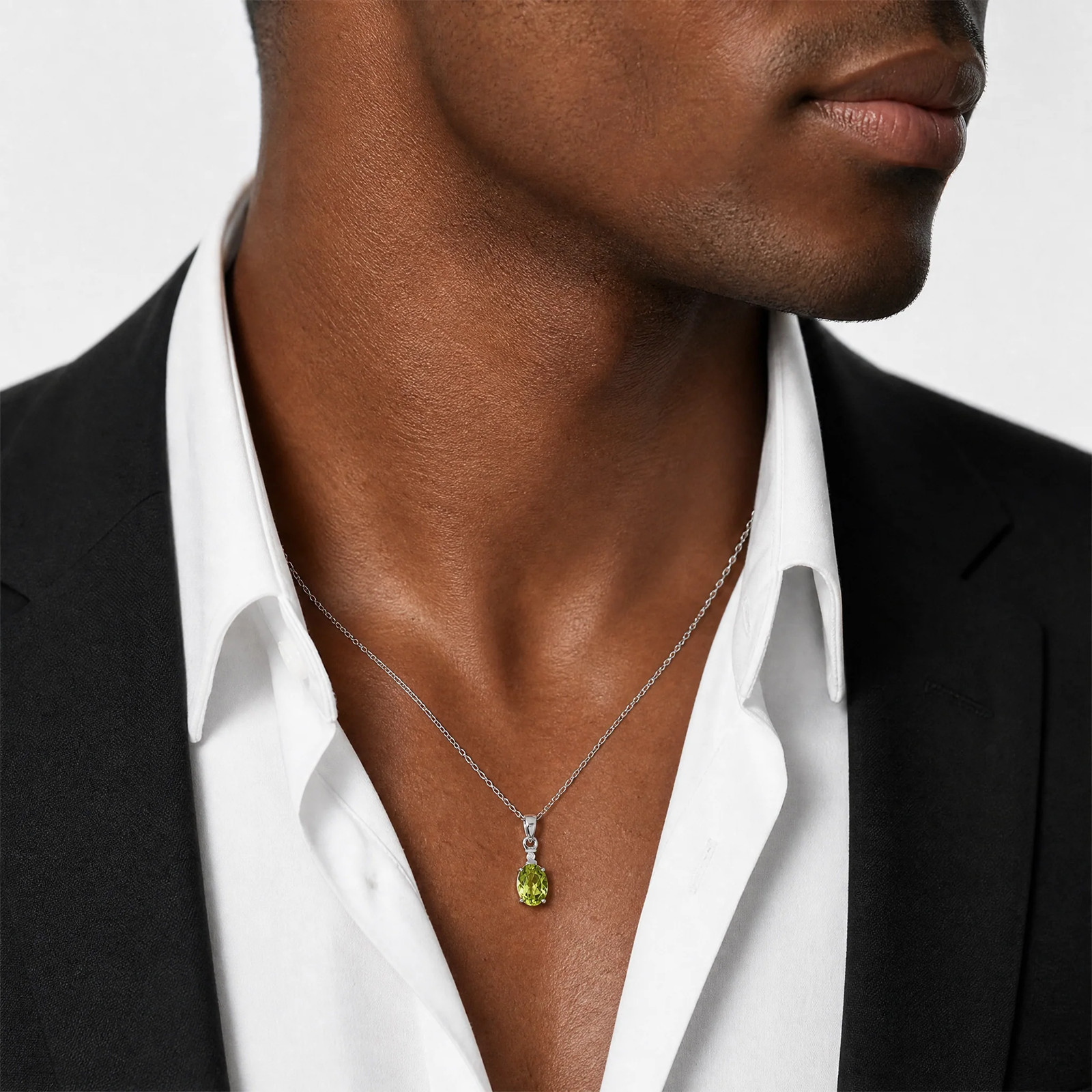 Sterling Silver Rhodium Plated Diamond And Peridot Oval Pendant