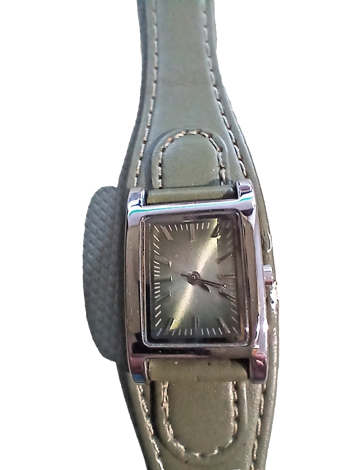 Ladies silver wathch with green face and one piece strap, new battery