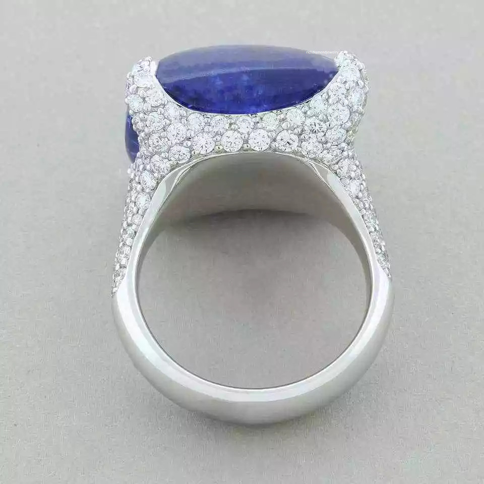 Featuring A 28.84CT Deep Purplish-Blue Tanzanite & Sparkling Pave CZ Huge Ring