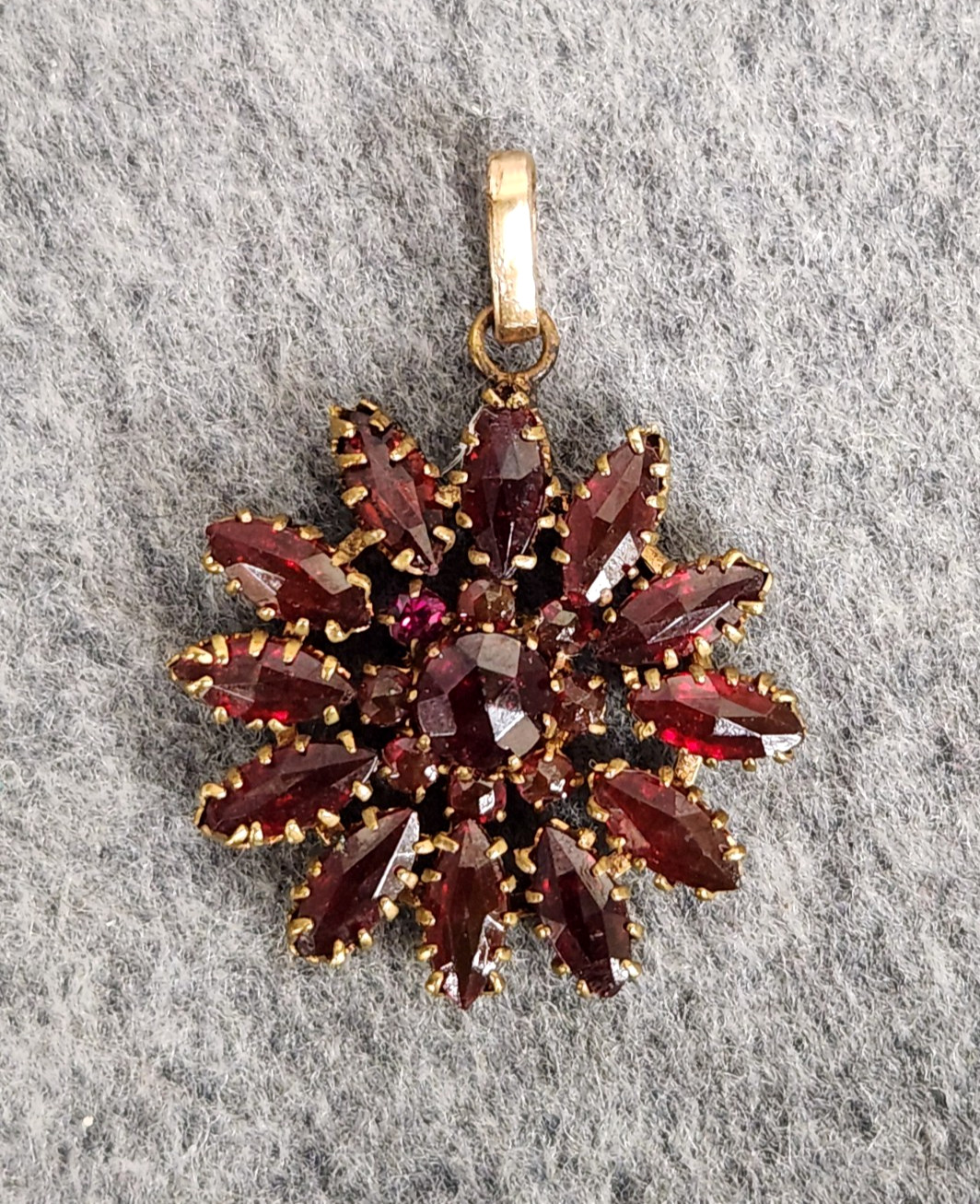 Vintage Gilt Metal Bohemian Red Glass Stone Starburst Floral Pendant 1 3/8″ Tall
