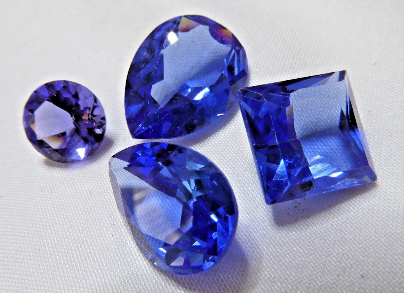 4 HUGE LAB CREATED TANZANITES