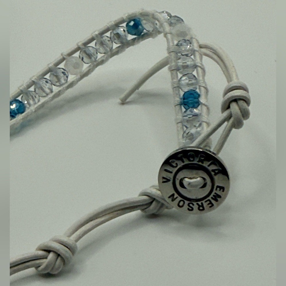 Victoria Emerson 5‑Wrap Bracelet – Iridescent Ice Blue Crystals on White Cord