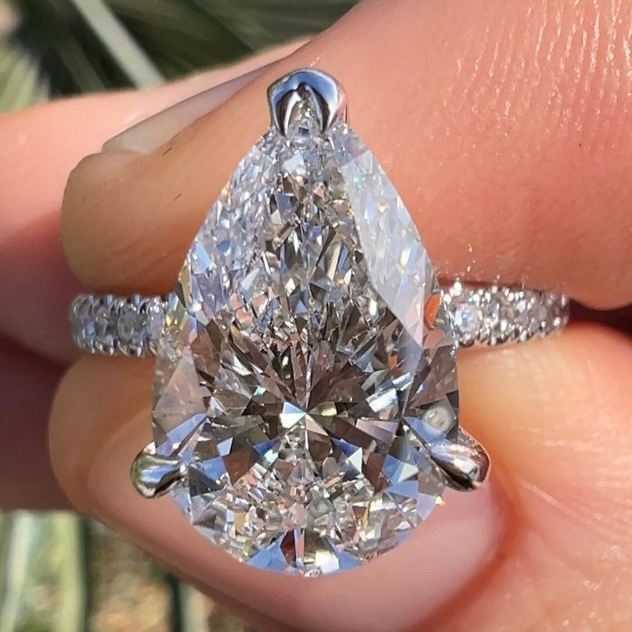 10x8mm Pear Cut Moissanite Hidden Halo Engagement Ring in 14K White Gold Plated