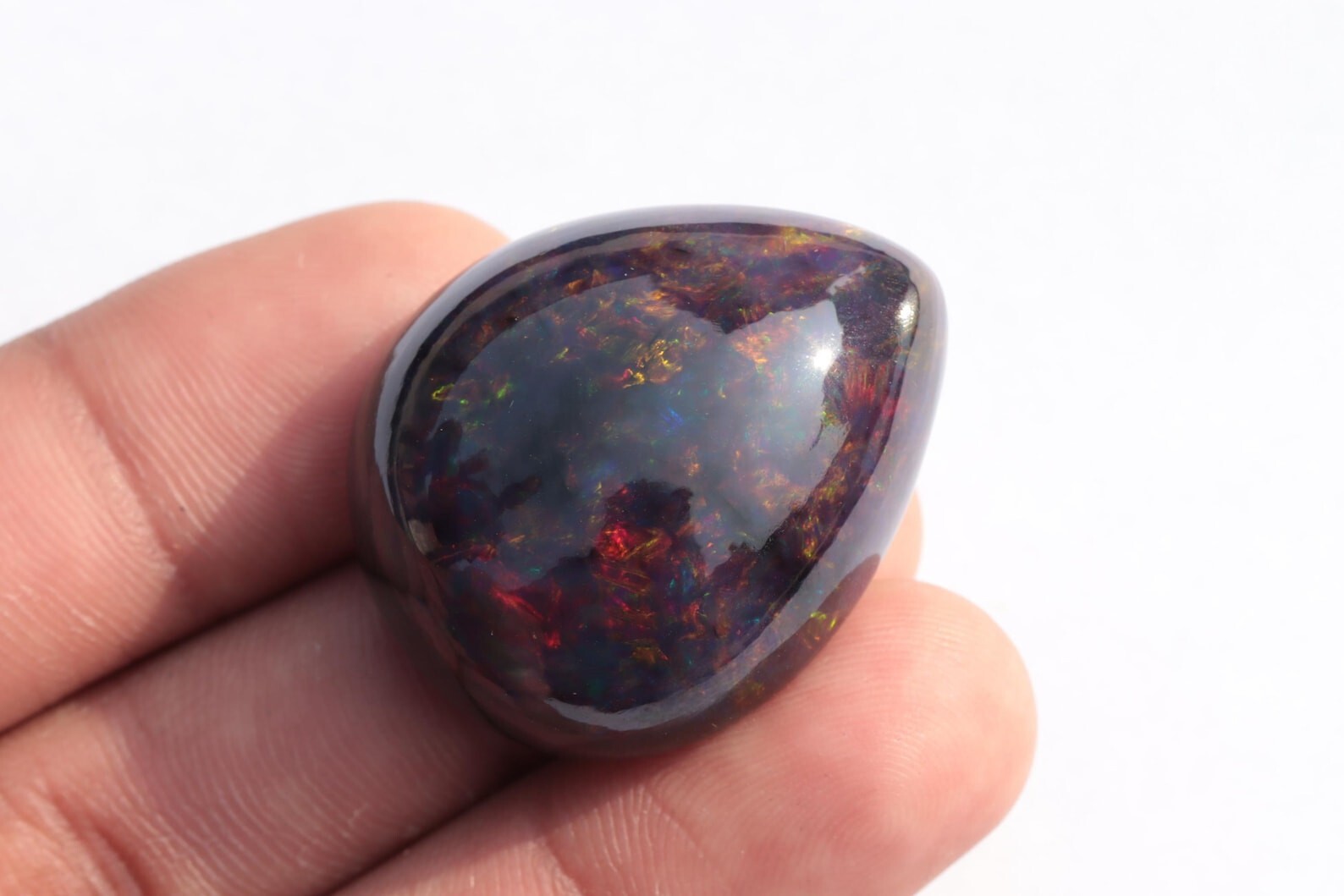 59.95 Carat Ethiopian Black Opal Cabochon 31x26x15 MM Pear Shape Welo Fire Opal