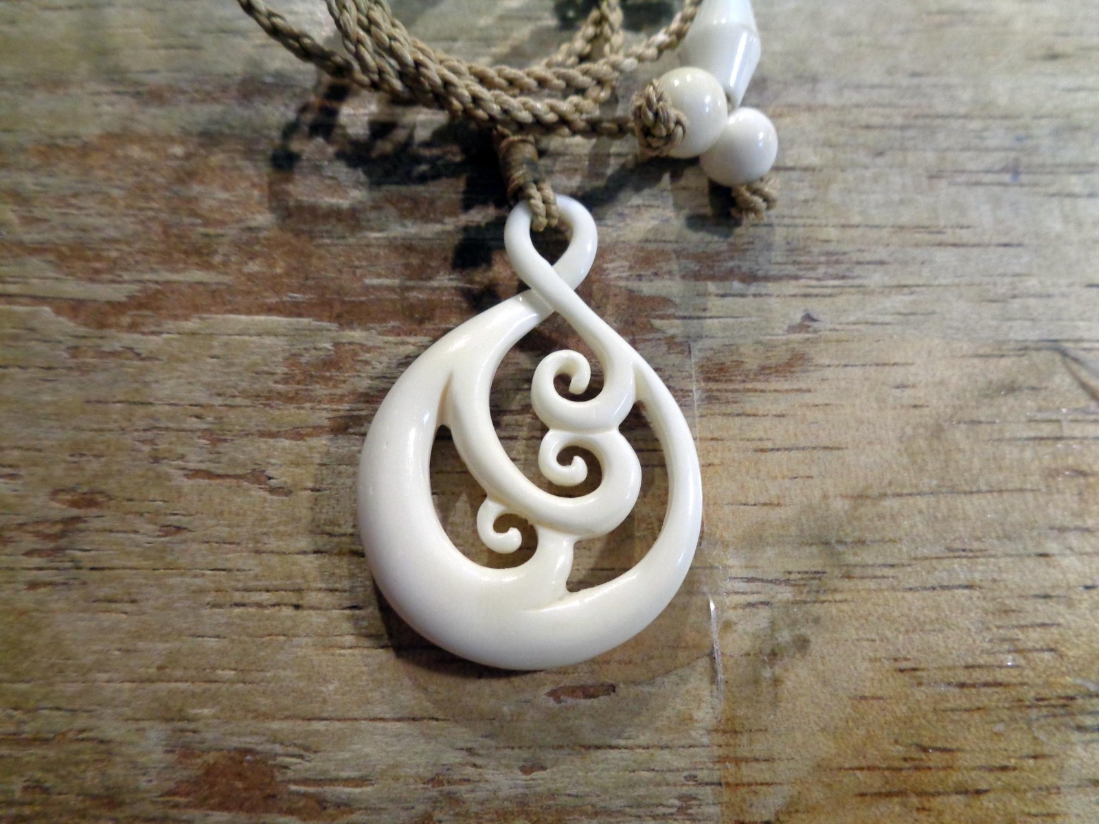 31MM HAND-CARVED WATER BUFFALO BONE MAORI WHAKAHOUNGA 3D TWIST KORU NECKLACE #2