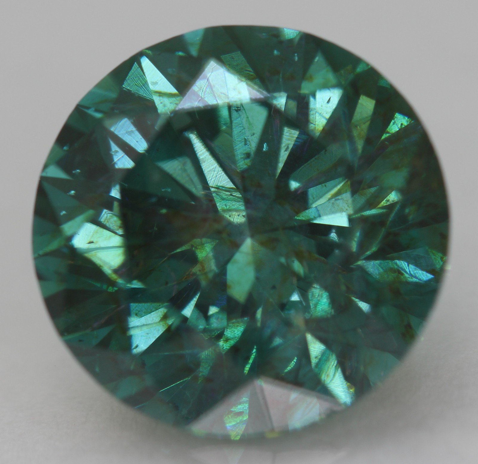 Cert 4.24 Carat Vivid Blue VVS2 Round Brilliant Natural Enhanced Diamond 10.2mm