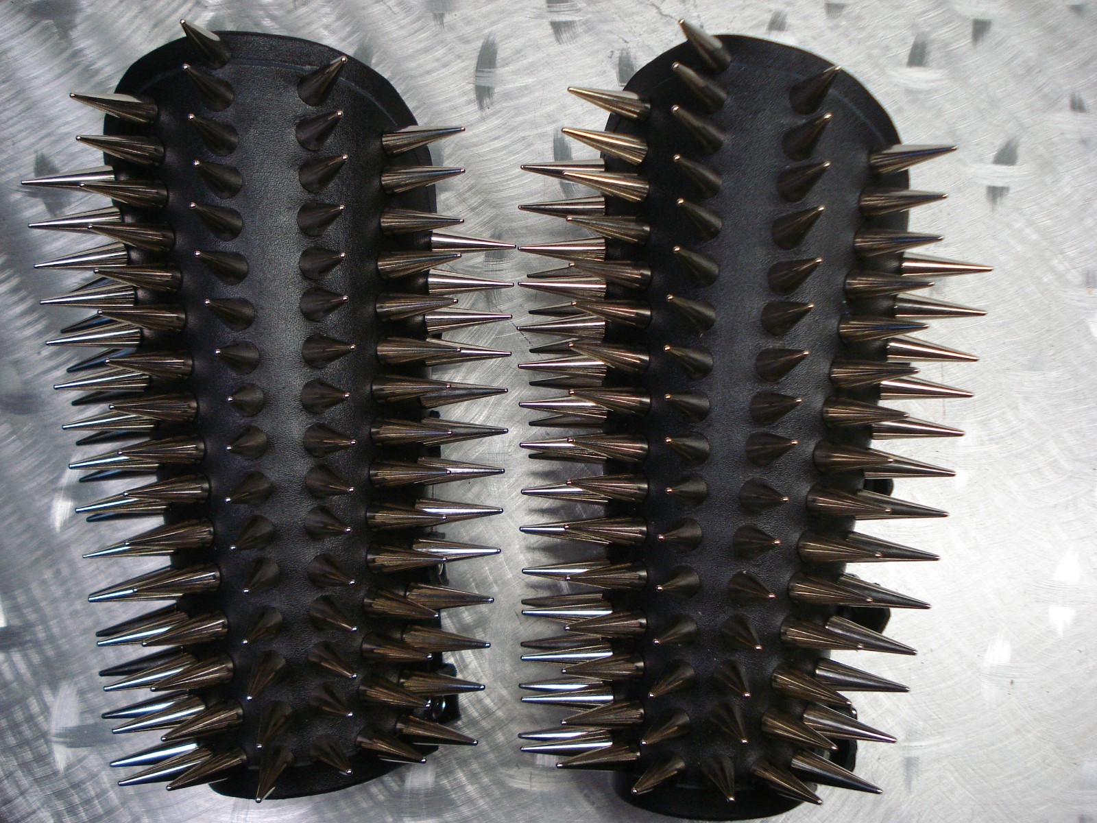 LEATHER SPIKED CONE GAUNTLET. BLACK METAL… (MDLG0231)….. BEHEXEN