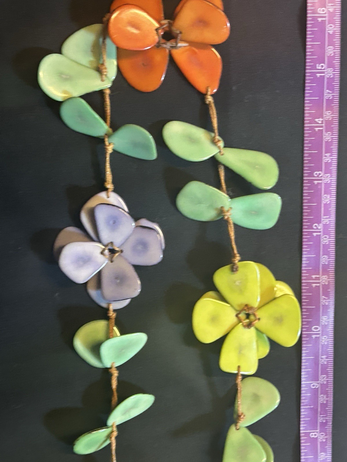 Necklace – Ceramic Artsy Flowers And Petals Strung On Leather.