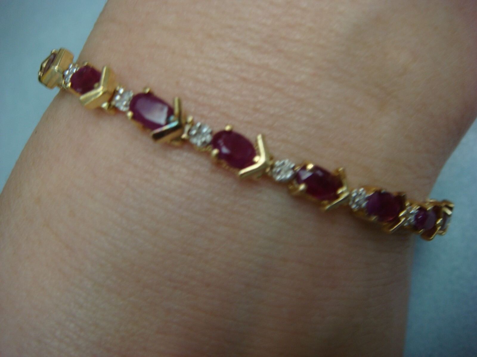 14 KT YELLOW GOLD GENUINE RUBY AND DIAMONDS TENNIS BRACELET 8.8 GRAMS 6.5 “