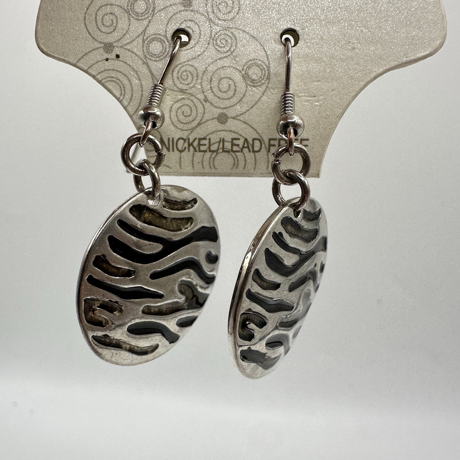 VTG New Silver Tone Dangle Earrings Round Tiger Zebra Emboss Nickel/Lead Free