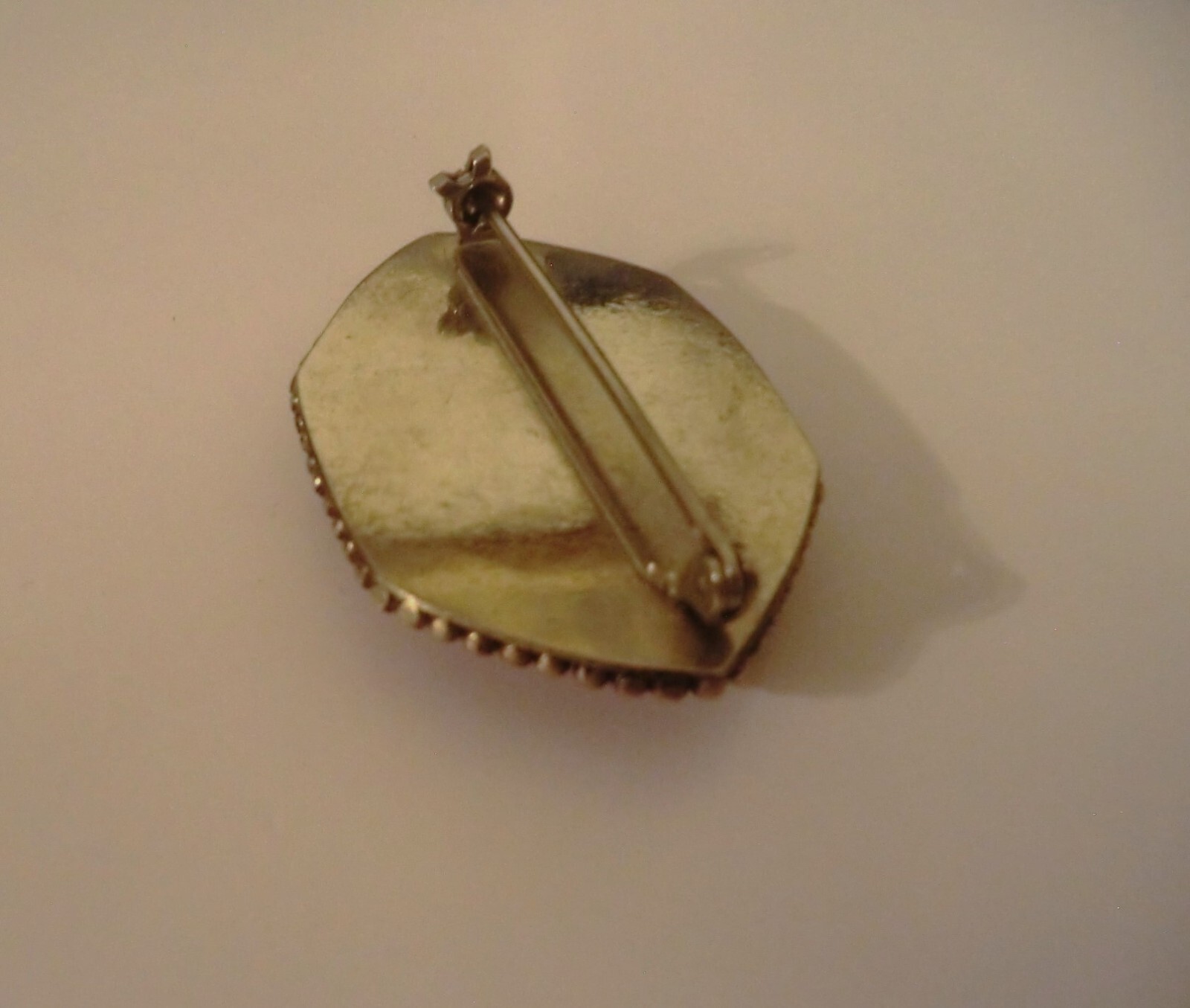 LARGE PINK BONE BROOCH WITH TAJ MAHAL- TYPE WINDOW DESIGN – HEXAGON SHAPE