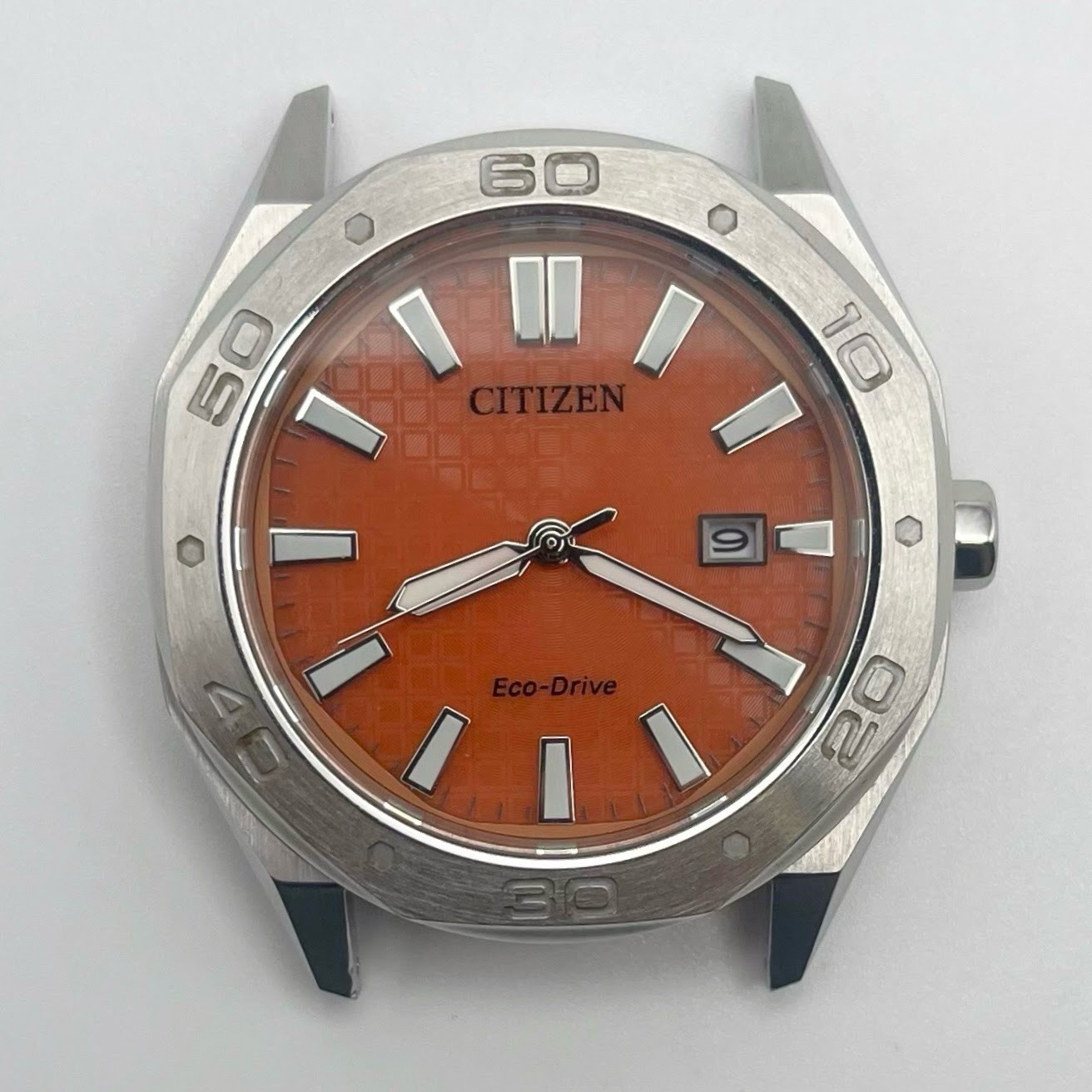 Citizen Eco-Drive Quartz Orange Waffle Dial Date 10 BAR WR E111-009R501 42mm