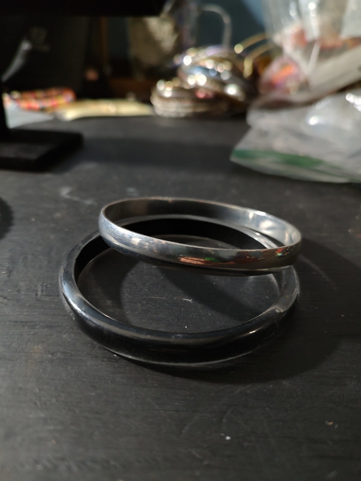 Lot of 2 Round Metal/Plastic Bangle Bracelets, Silver & Black, No Stone