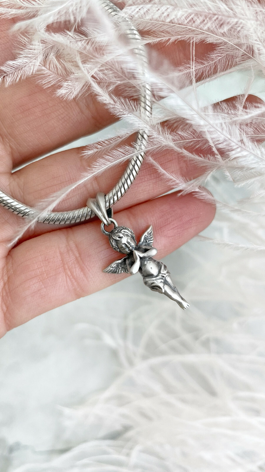 Angel. Pendant. Sterling silver,oxidised.