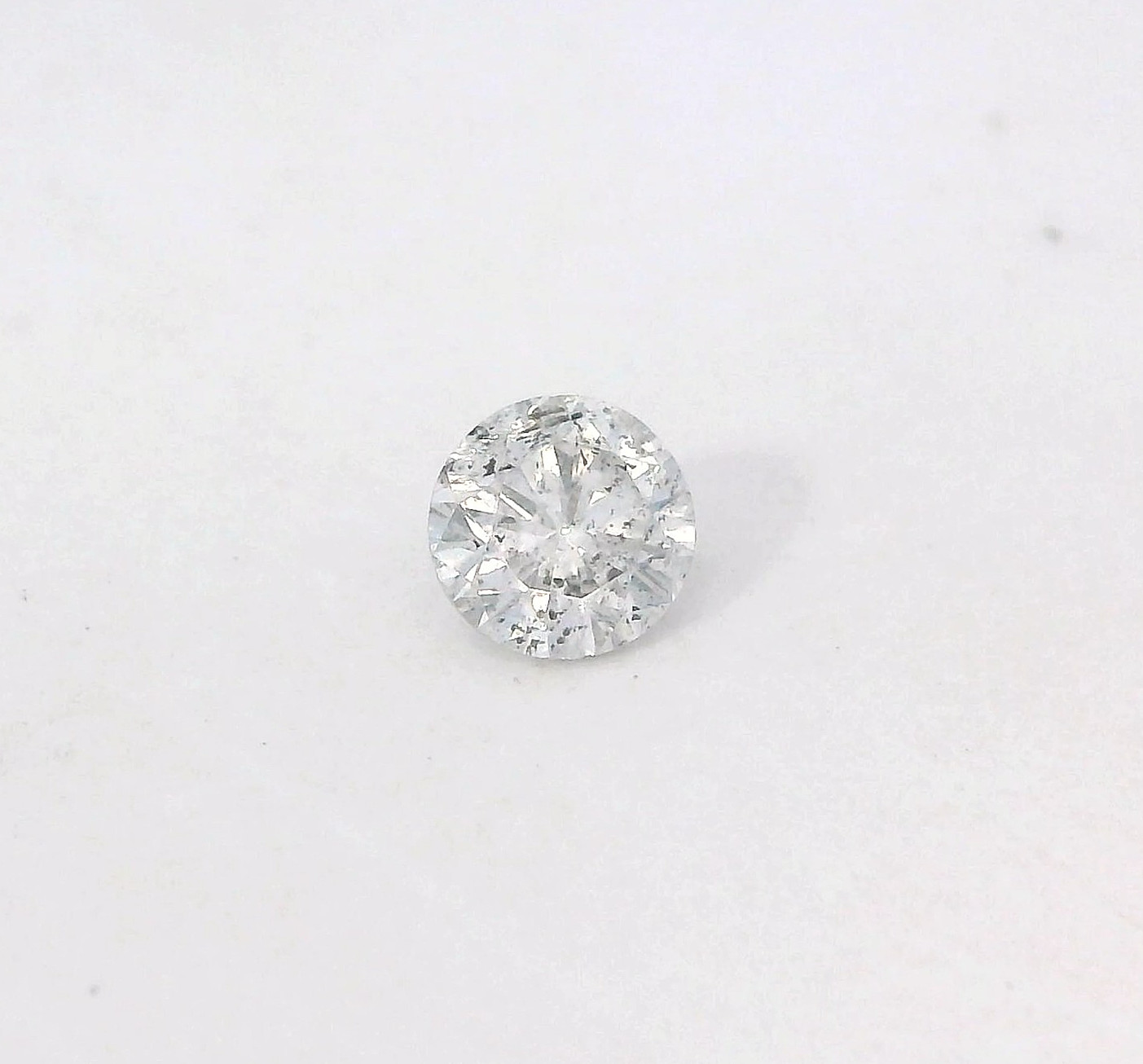 0.27ct Round Brilliant Cut Natural Diamond G color, I2 clarity 4.0 x 2.5 mm