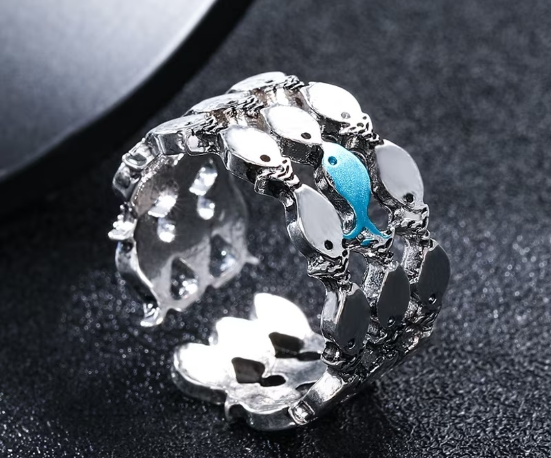 “Swim against the current” ring (blue fish)