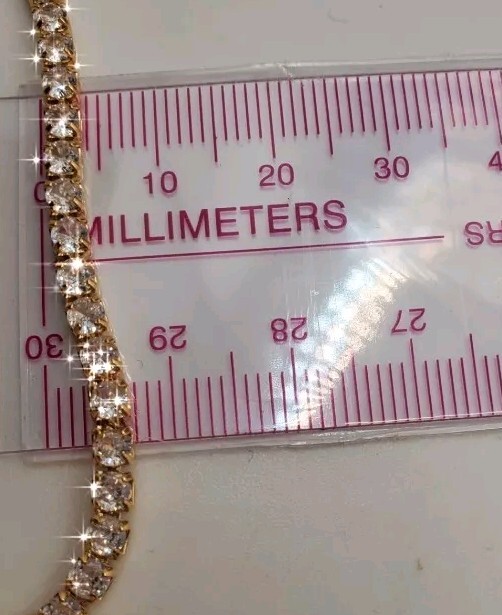 14k Gold Overlay Adjustable Slider Tennis Bracelet Made With Swarovski Crystals