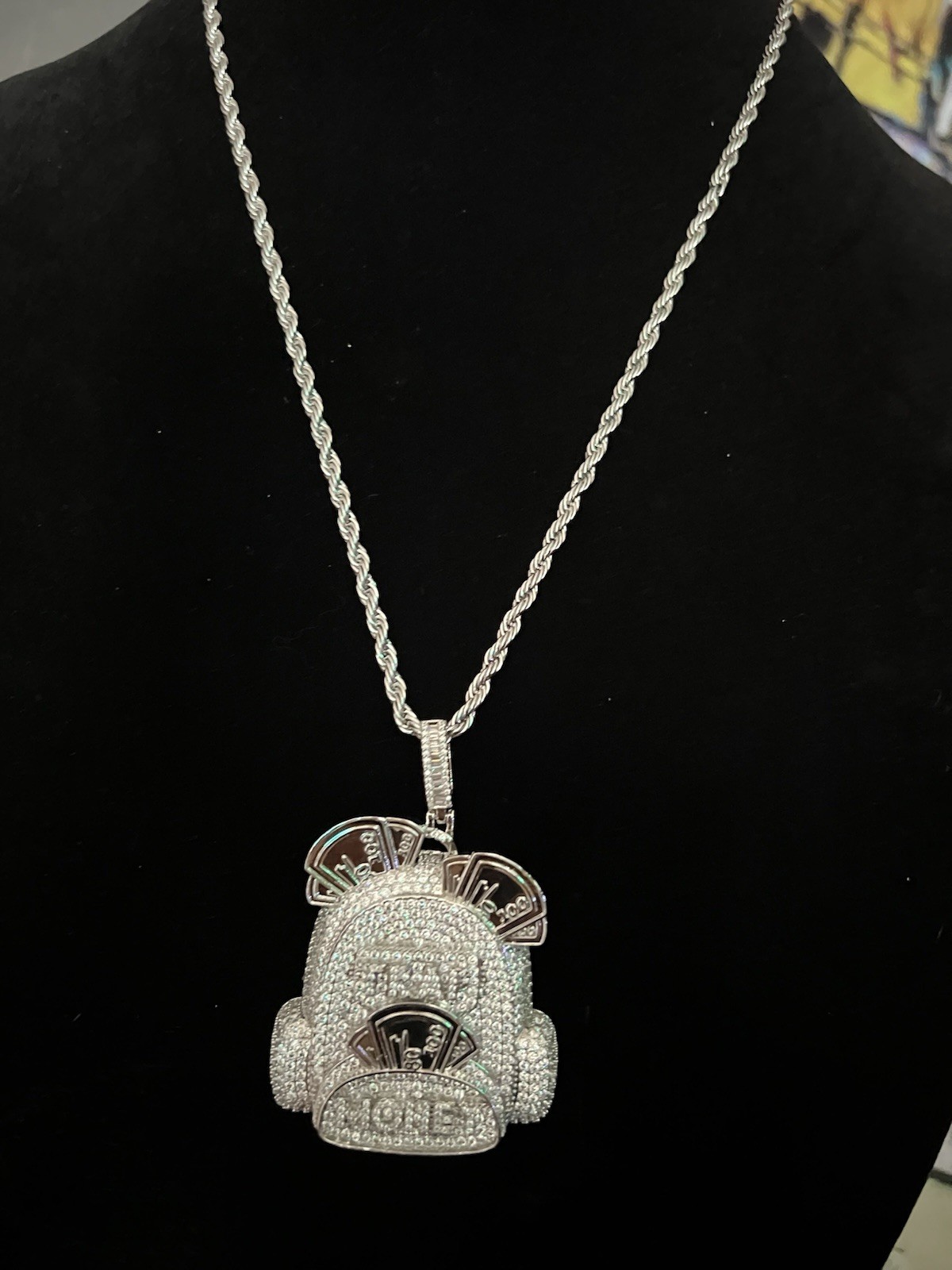 24” stainless steel necklace with iced out 5A Cz backpack pendant