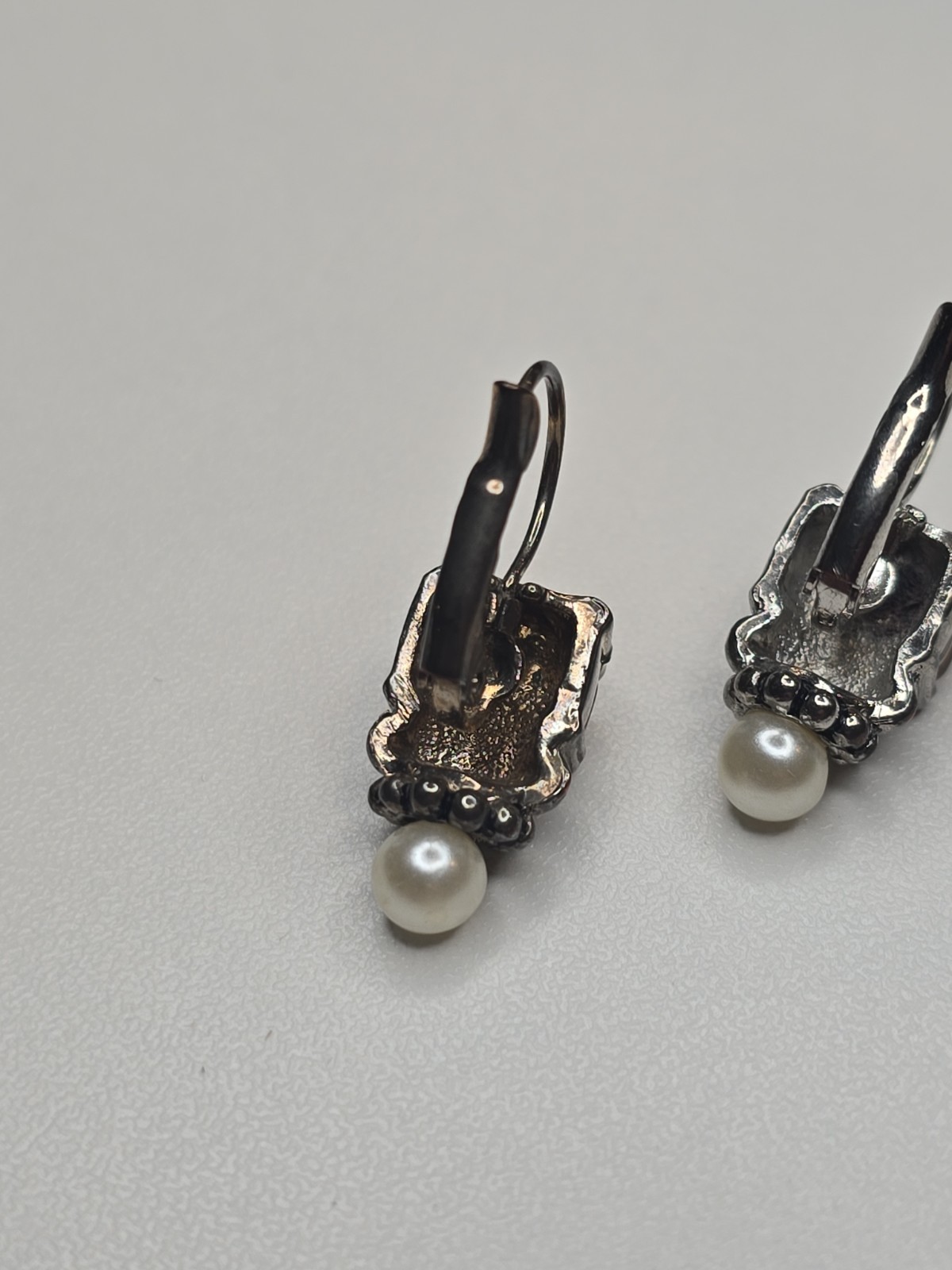 sterling silver Lagos earrings, smoky quartz stone and pearl accent.