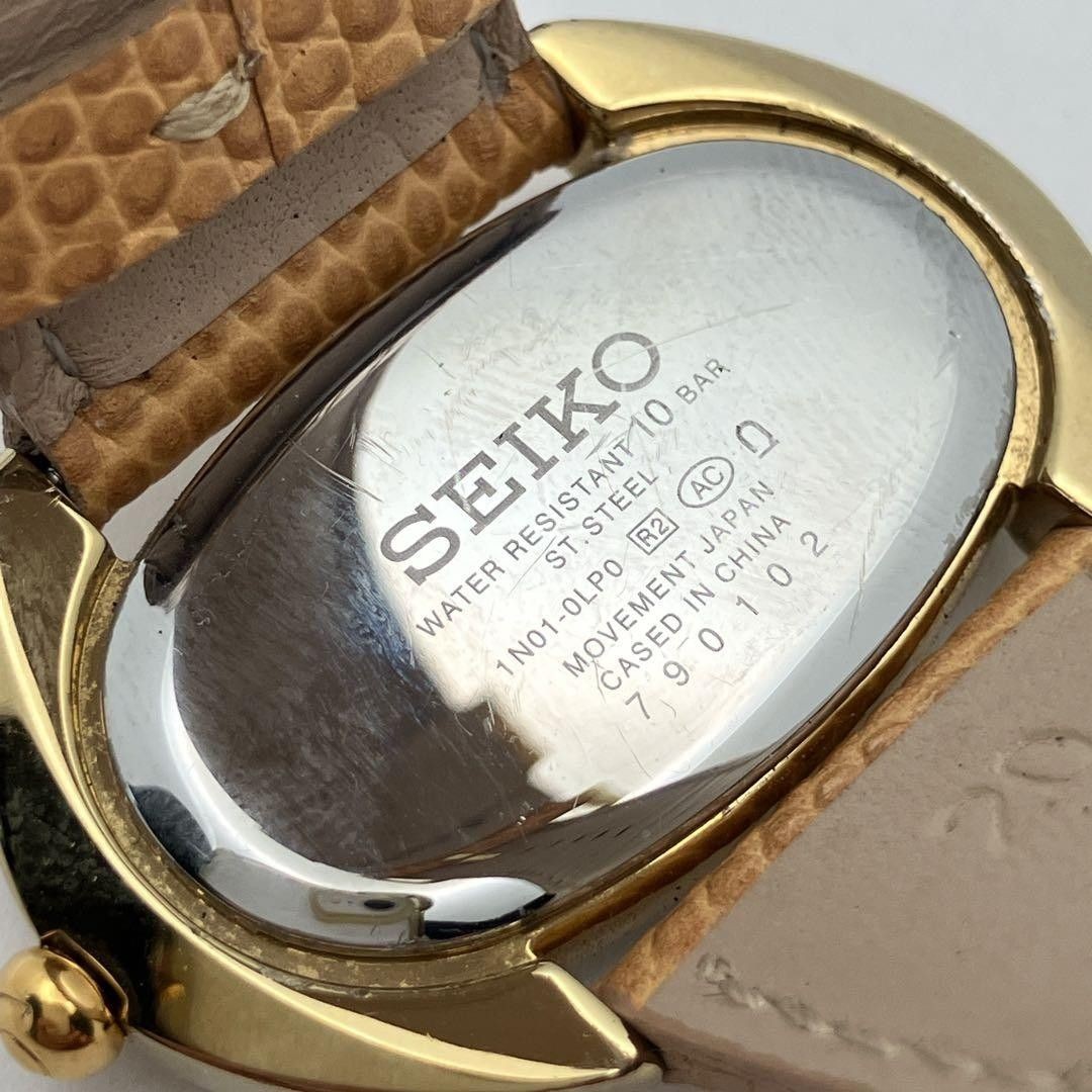 Working item SEIKO wristwatch oval quartz new battery ladies