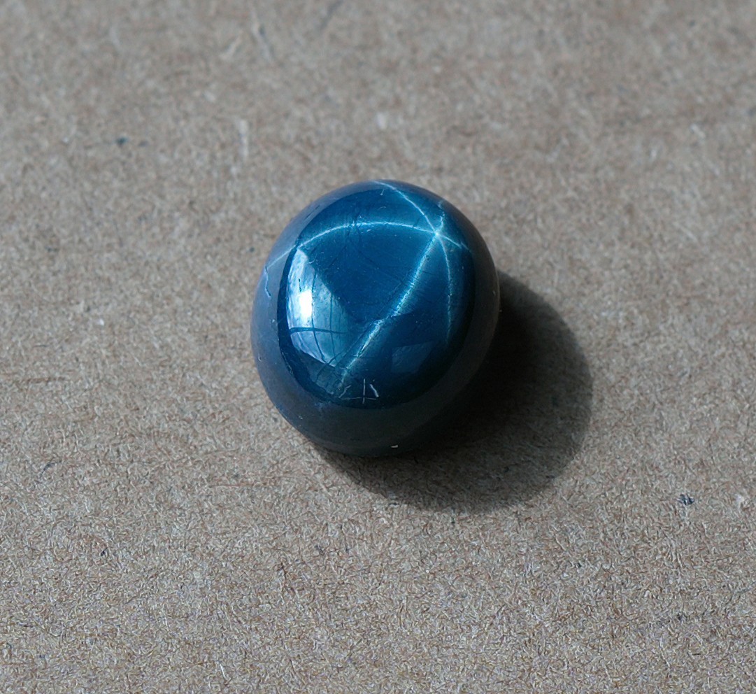 **GIA Certified** 24.87 carat natural star sapphire, titanium diffused
