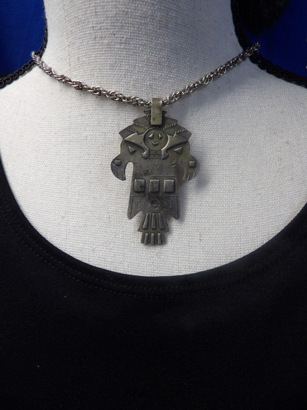 Navajo Kachina Totem Turquoise BRanded Nickle Silver Bell w/28″ Braided Chain.