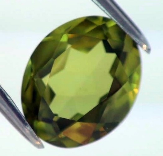 MAN MADE SYNTHETIC PERIDOT 11 x 9 MM OVAL CUT OUTSTANDING COLOR AAA