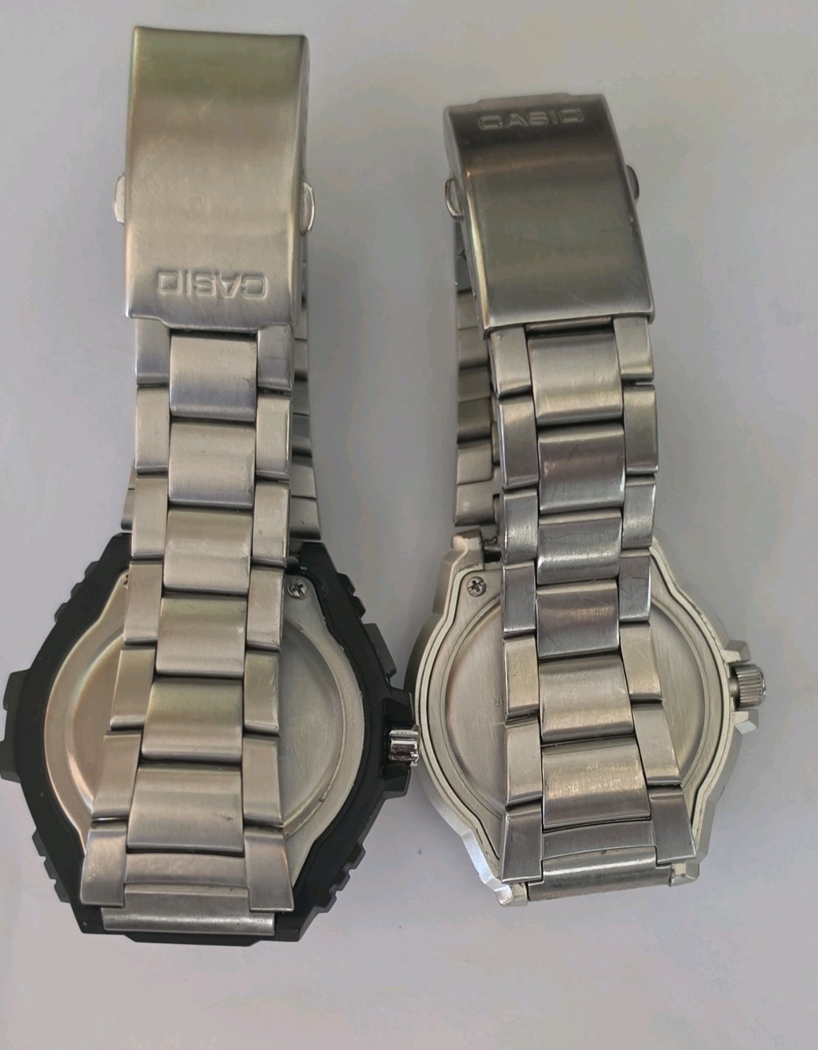 Casio pair of Men’s Quartz Analog Stainless Bracelet watches. MRW-200H. MWA-100H