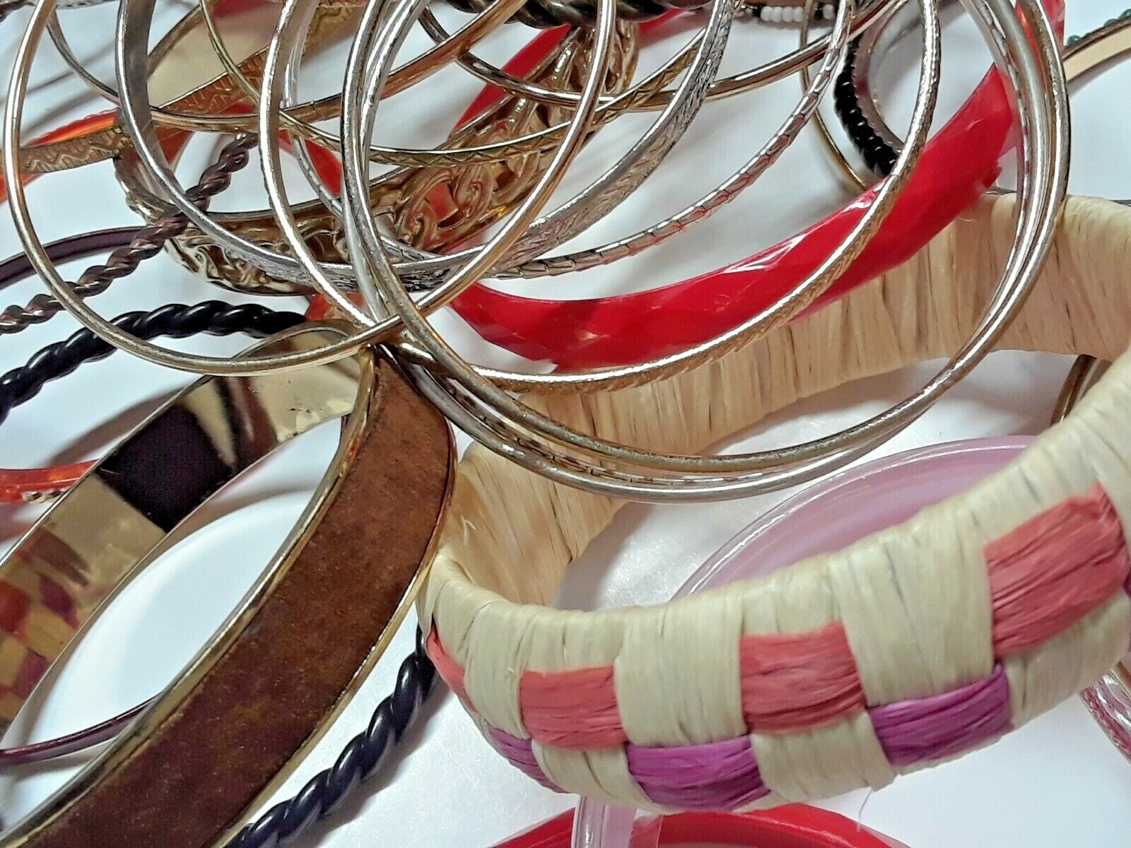Bangle bracelets. gold tone silver tone, metal, plastic, with patterns. Lot