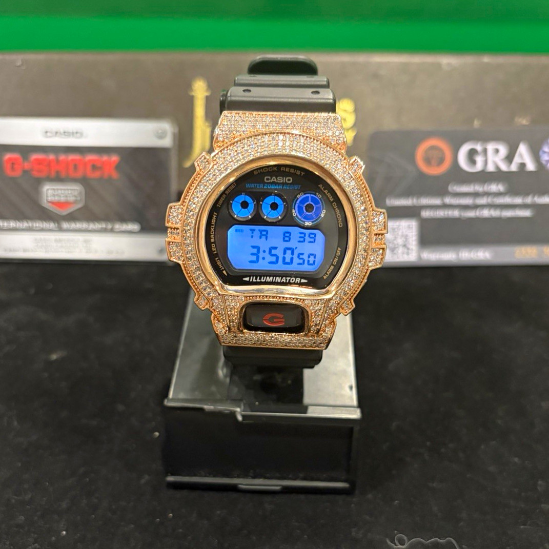 Casio G-SHOCK Digital Quartz Rose Gold Bezel Black Resin Strap 200m Papers
