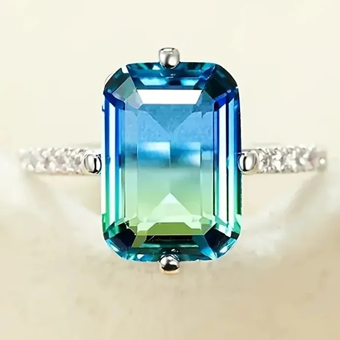 Luxurious Women’s Engagement Ring with Gradient Blue-Green Cubic Zirconia