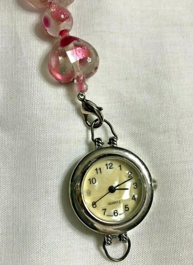 Watch w rose pink glass acrylic bracelet band approx 6 inches