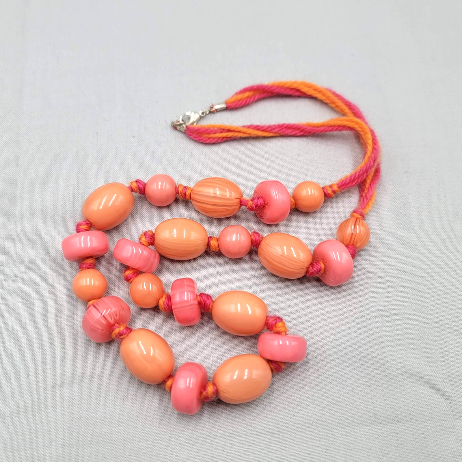 Artisan Peach Pink Cane Glass Bead Necklace Hand Knotted Yarn Cord 24 in