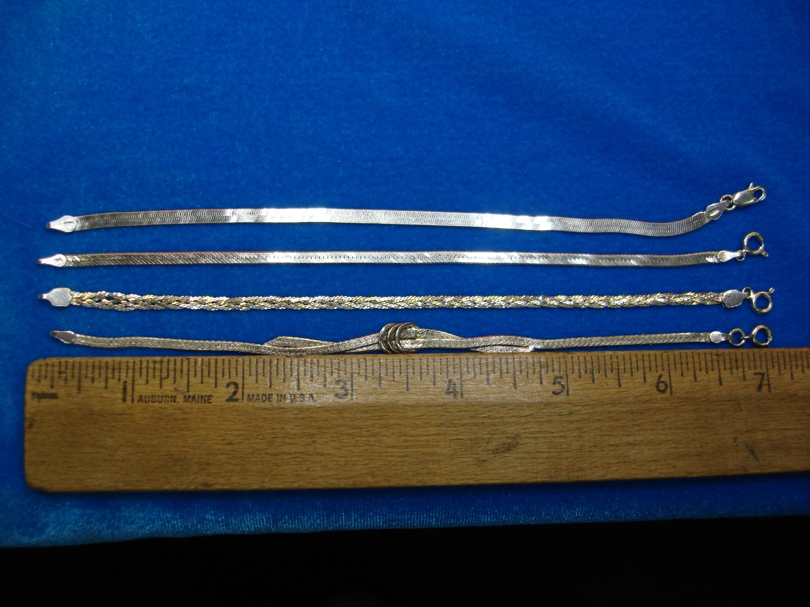 4 PRETTY STERLING SILVER BRACELETS – ALL DIFF. – NICE TOO