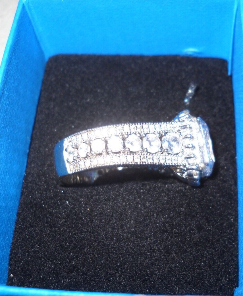 BELLA LUCE 7.83 CTW White Diamond Simulant RHODIUM OVER STERLING SILVER Ring