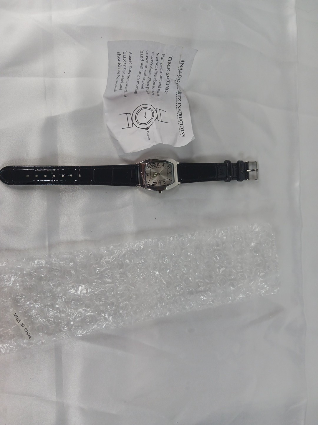 New Quartz watch. Tonneau / Barrel Case Shape. Roman Numerals