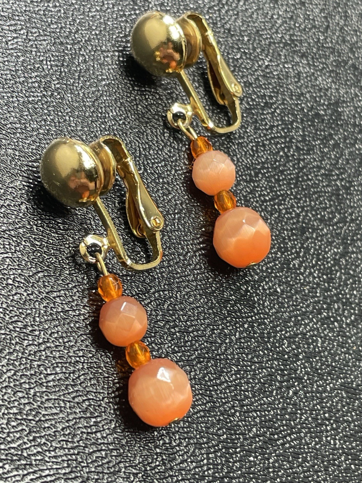 Vintage 1.4” Orange Faceted Art Glass Gold Tone Dangle Clip Earrings