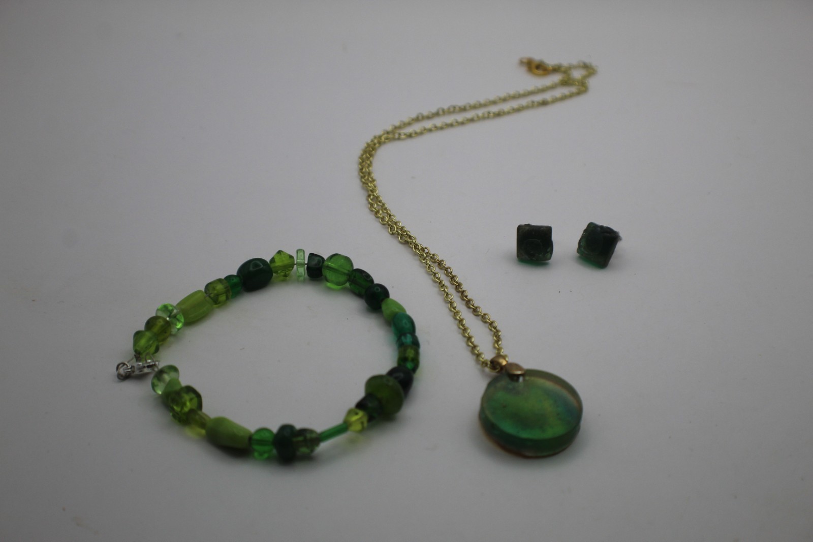 Green Three Piece Resin Jewelry Set Including Necklace Studs And Bracelet