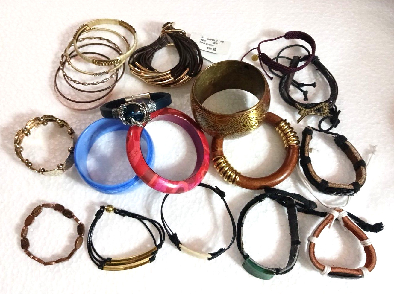 Bracelets. wide metal bangle bracelet, plastic bangles, wood, stones. Lot of 21