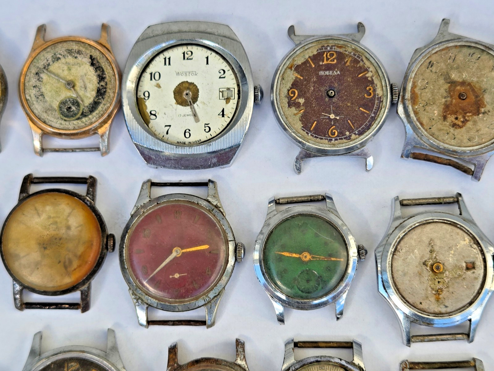 Lot of 75 Russian Watches Vostok Pobeda Mayak Zim etc Not working for parts Read