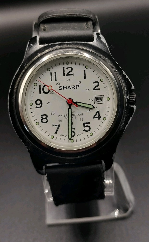 Sharp SHP-1607 Water Resistant to 100 feet Wristwatch. Needs battery.