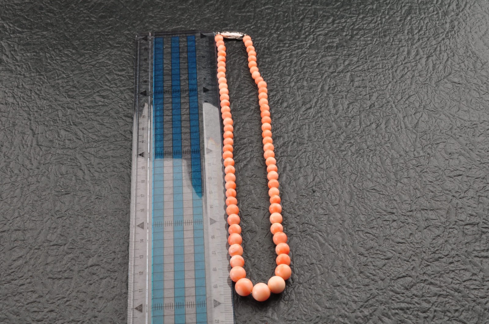 Salmon pink coral Necklace and ear clip set (total 116ct) with Certificate case.