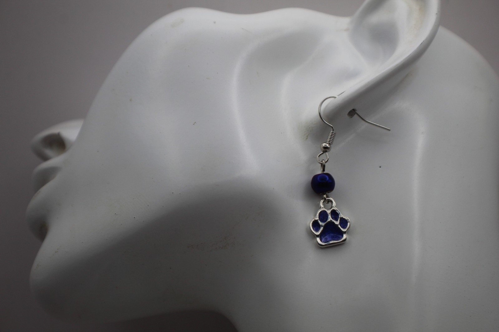 Cute Purple Paw Print Resin Pendant On A Beard Chain Necklace.