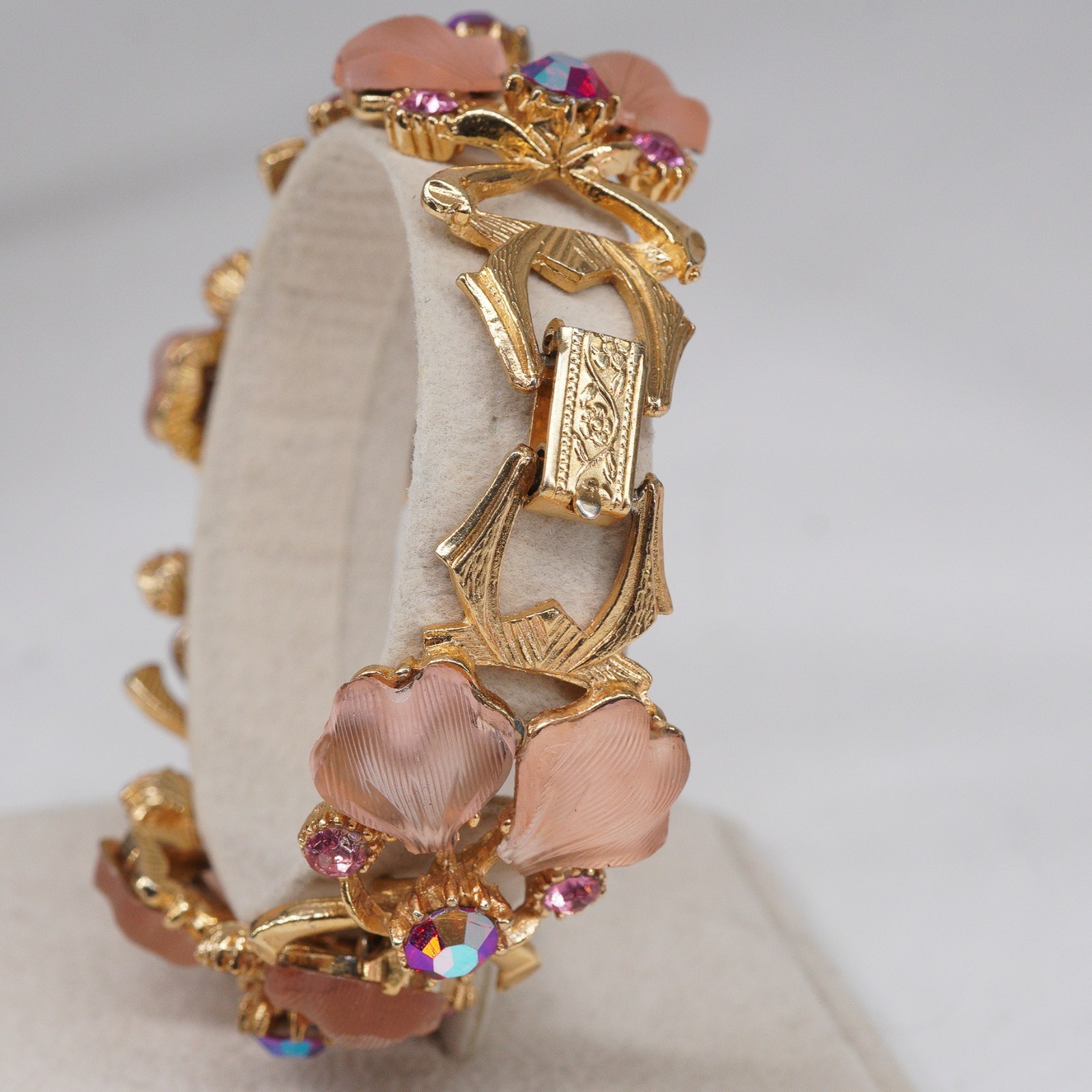 VTG bracelet Molded Glass Leaves AB Pink Rhinestones in Goldtone fold over clasp