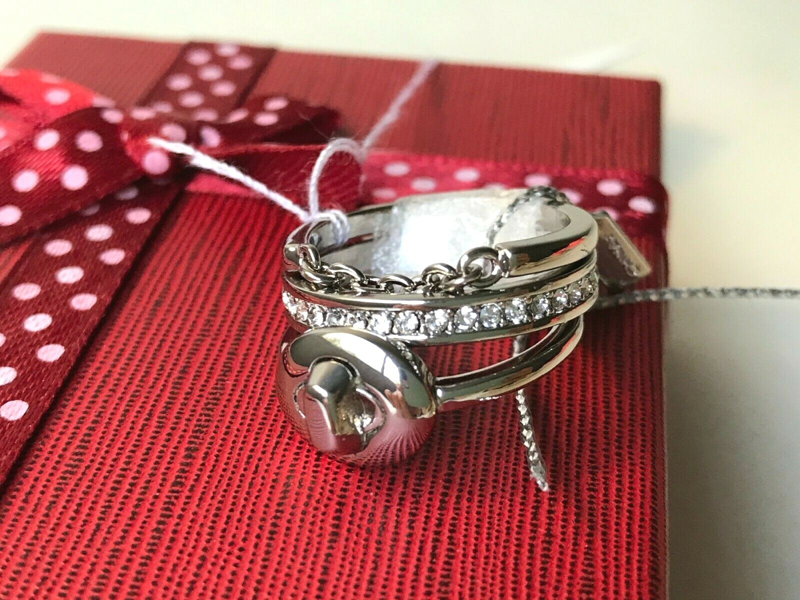 Coach pave turn-lock ring set