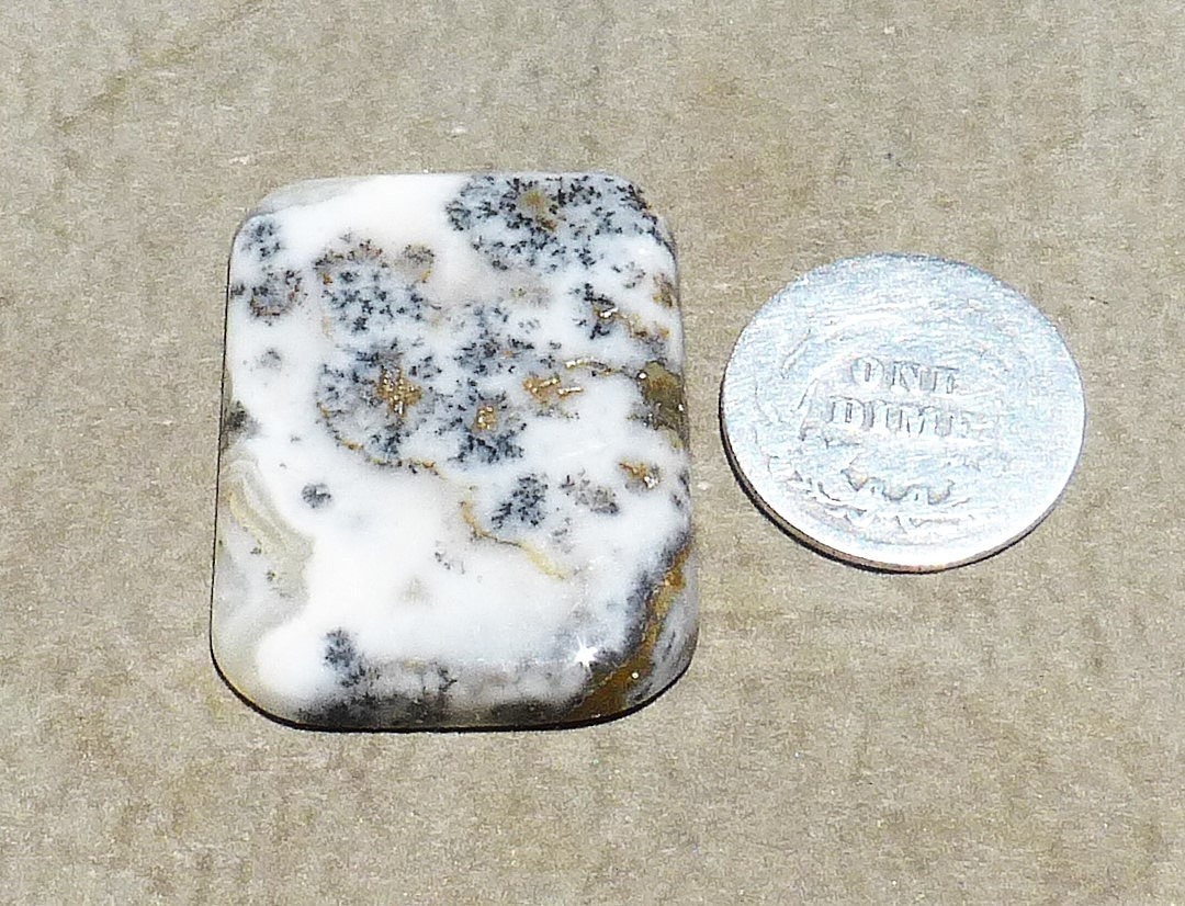 NATURAL manganese dendrites in calcite cabochon from California (30.70 cts.)