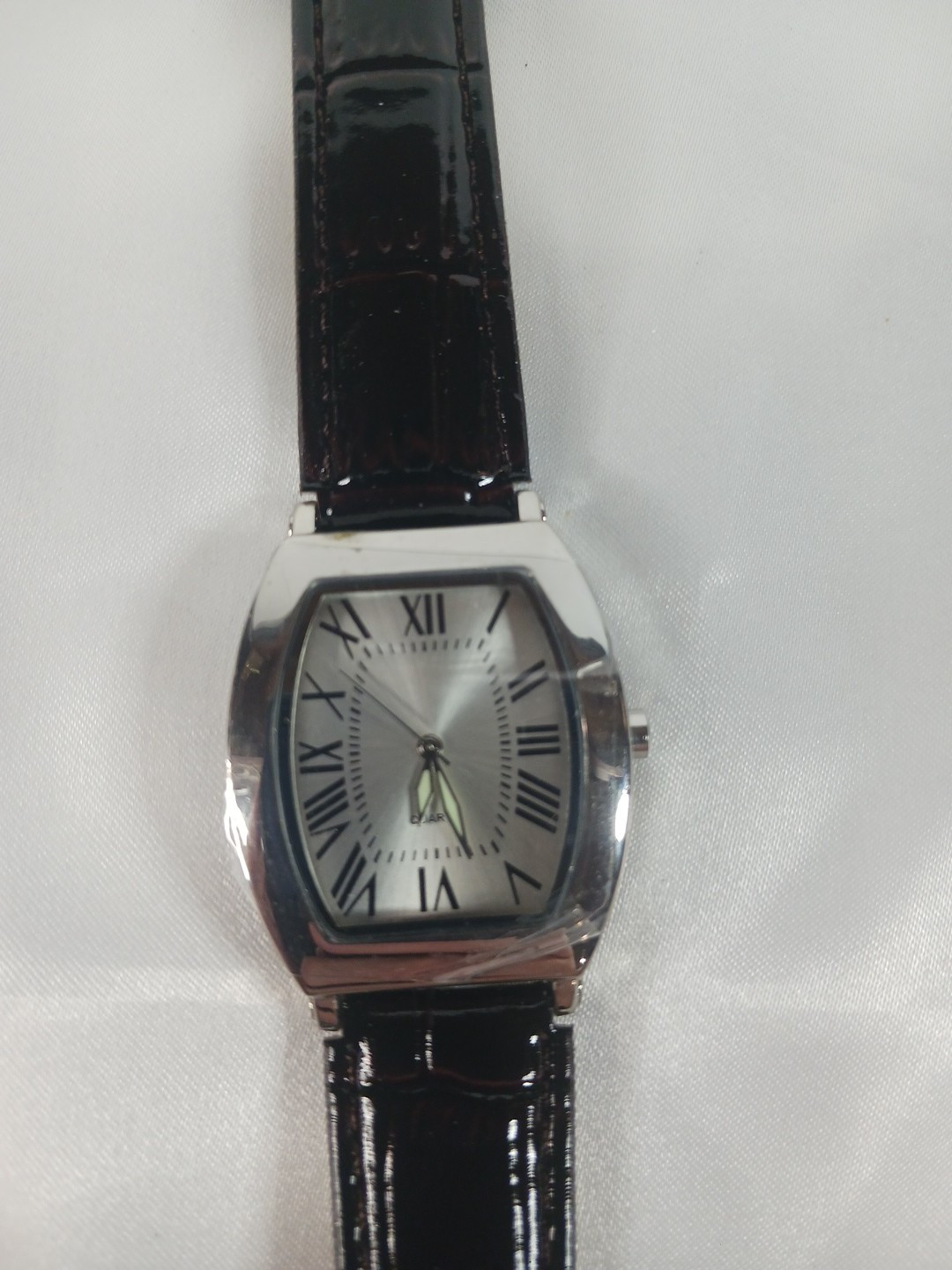 New Quartz watch. Tonneau / Barrel Case Shape. Roman Numerals
