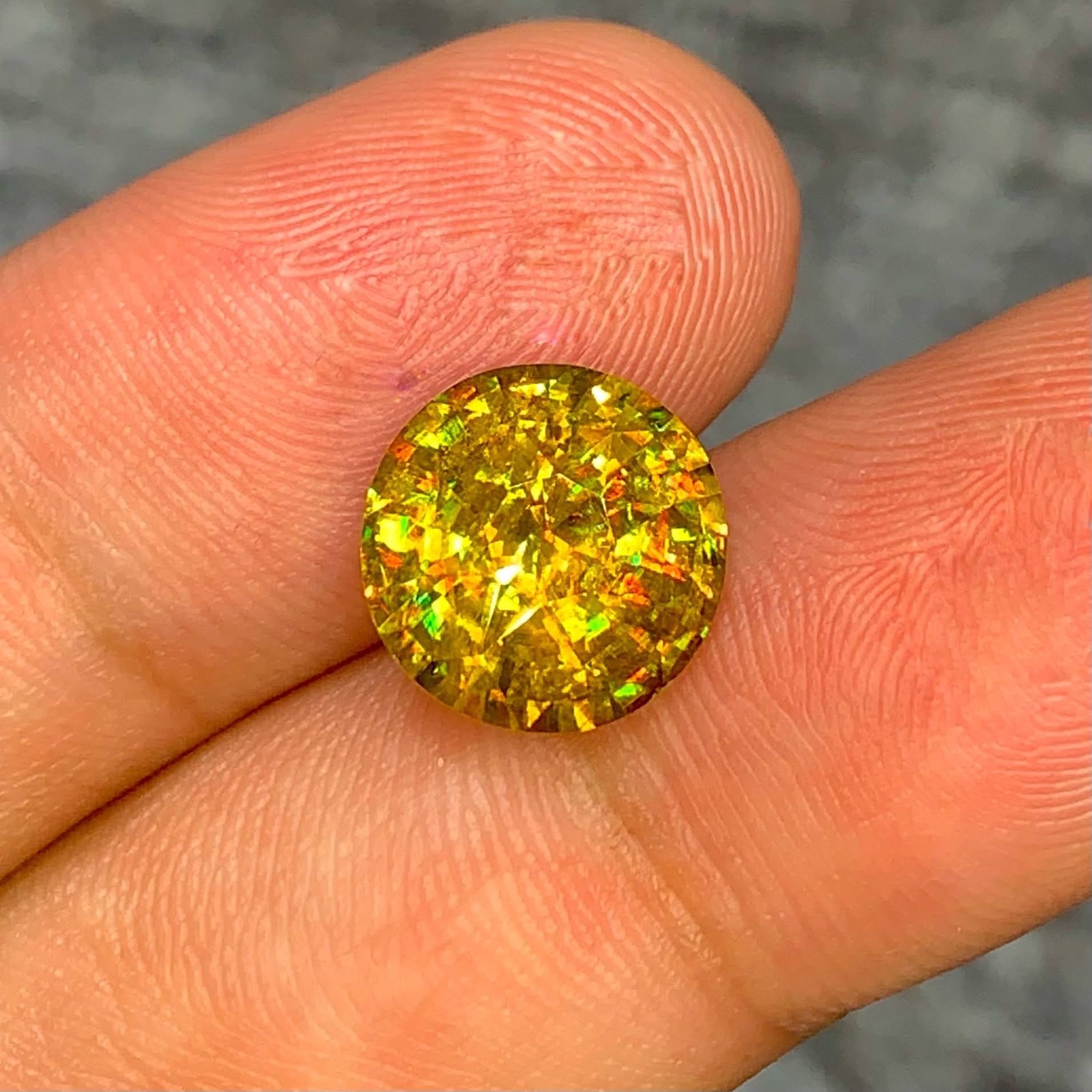 5.37 Carats Natural Fancy Rainbow Sphene Round Cut From Madagascar