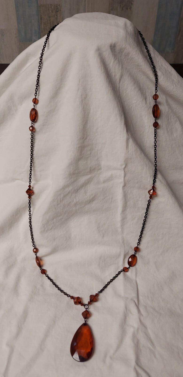 20.5in Black chain necklace with a 2in pendant.