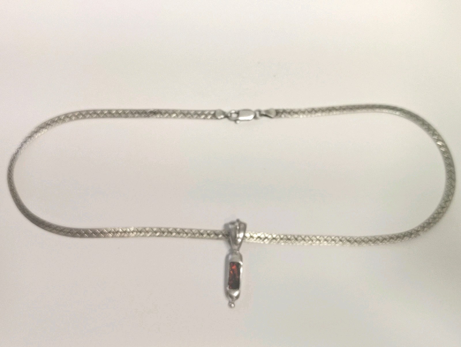 Korite Ammolite In Silver On 5 mm 16″ Sterling Silver Herringbone Chain